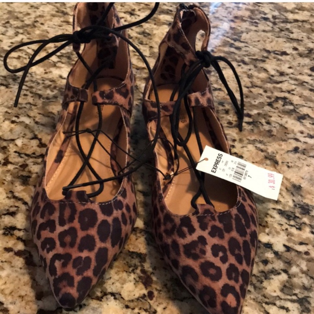 NWT cheetah lace up flats